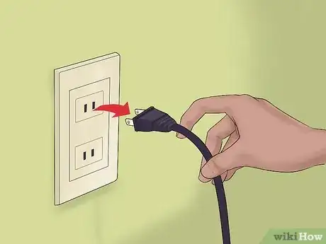 Image titled Give First Aid to an Electrocuted Animal Step 1