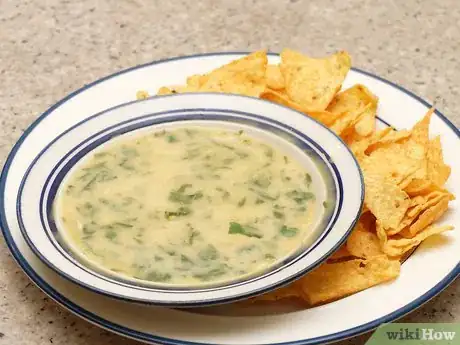 Image titled Make Slow Cooker Artichoke Dip Final