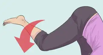 Do Standing Splits at the Wall in Yoga