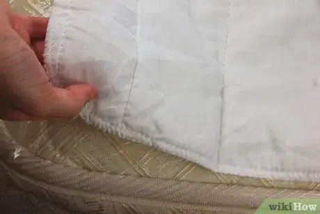 Image titled Use Hardware Store Plastic Sheeting as a Bedwetting Sheet Step 5