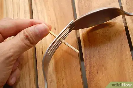 Image titled Make a Fork and Spoon Appear to Defy Gravity Step 4