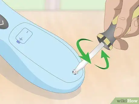 Image titled Put Batteries in Correctly Step 4