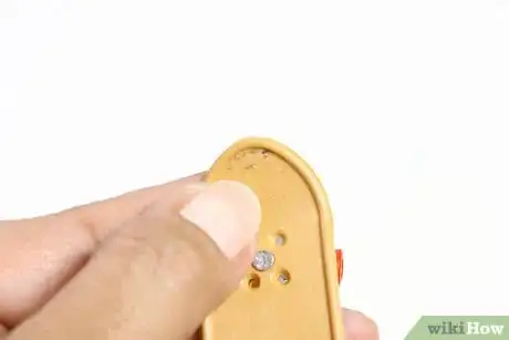 Image titled Take Griptape Off of a Tech Deck Step 5