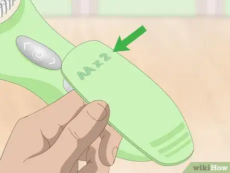 Image titled Put Batteries in Correctly Step 5