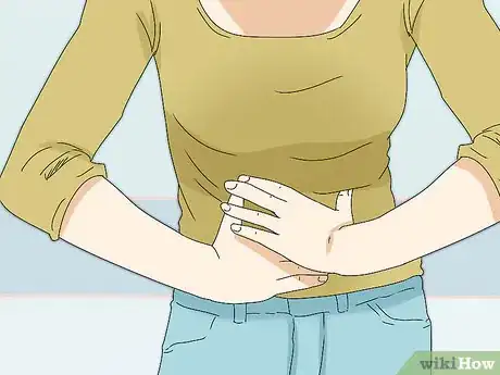 Image titled Reduce Heavy Menstrual Cramps Step 1
