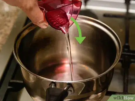 Image titled Make Spun Sugar Cobwebs Step 5