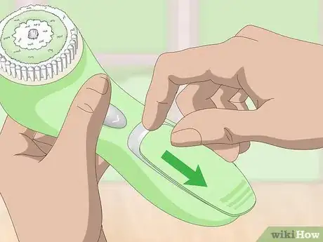 Image titled Put Batteries in Correctly Step 2