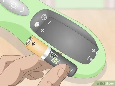Image titled Put Batteries in Correctly Step 8