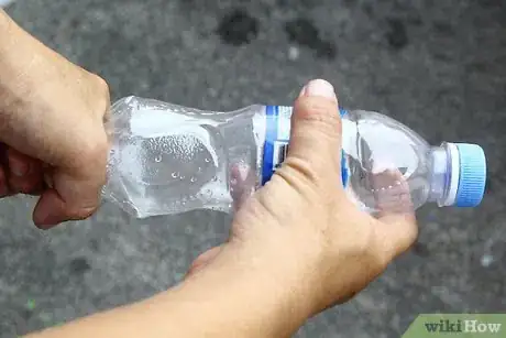 Image titled Pop a Water Bottle Manually Step 2
