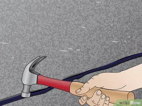 Image titled Fill Asphalt Cracks Step 13