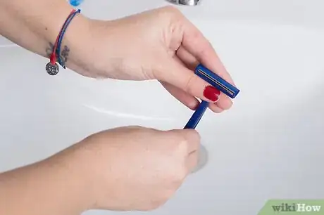 Image titled Shave Using Only a Razor and Water Step 2