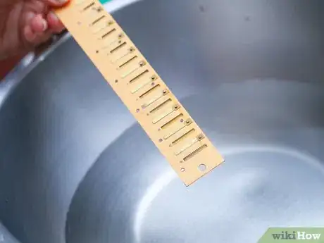 Image titled Clean a Harmonica Step 7