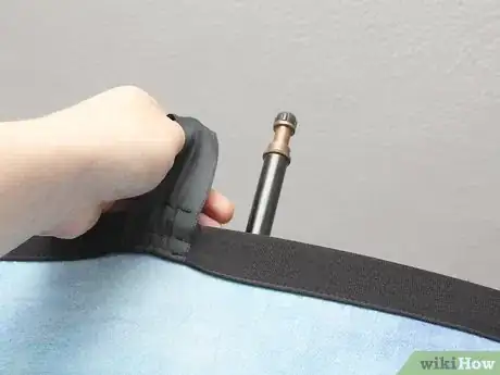 Image titled Get Wrinkles Out of Muslin Backdrops Step 3