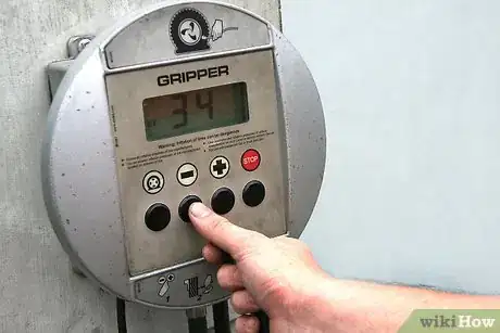 Image titled Check and Add Air to Car Tires Step 9