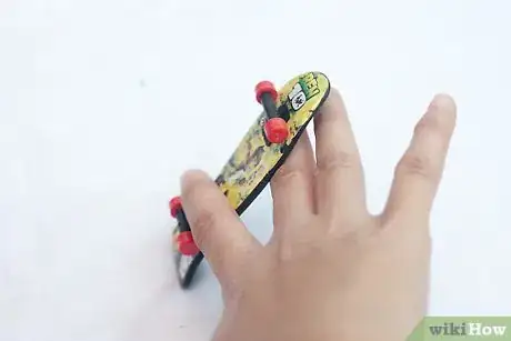 Image titled Do a Truckstand on a Tech Deck Step 6