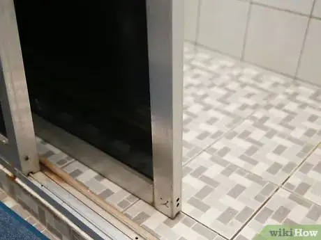 Image titled Remove Sliding Glass Shower Doors Step 6