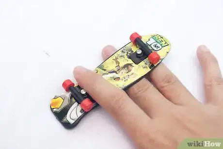 Image titled Do a Truckstand on a Tech Deck Step 7