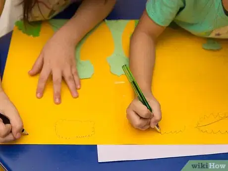 Image titled Make a Volcano out of Mentos and Soda Step 9