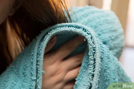 Image titled Change Wavy Frizzy Hair to Straight Hair Step 10