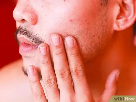 Image titled Shave With an Electric Shaver Step 6