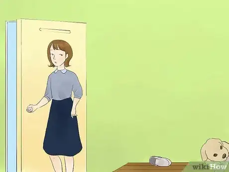 Image titled Calm a Hyperactive Dog Step 1