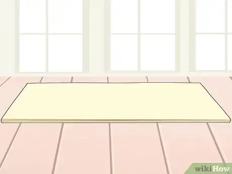 Image titled Do the Corkscrew in Pilates Step 1