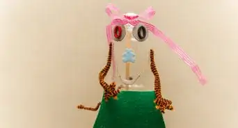 Make a Puppet with an Empty Bottle and a Broom Stick